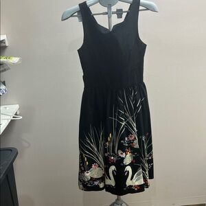 Lindy Bop Black Asymmetrical Dress with Swan Design
